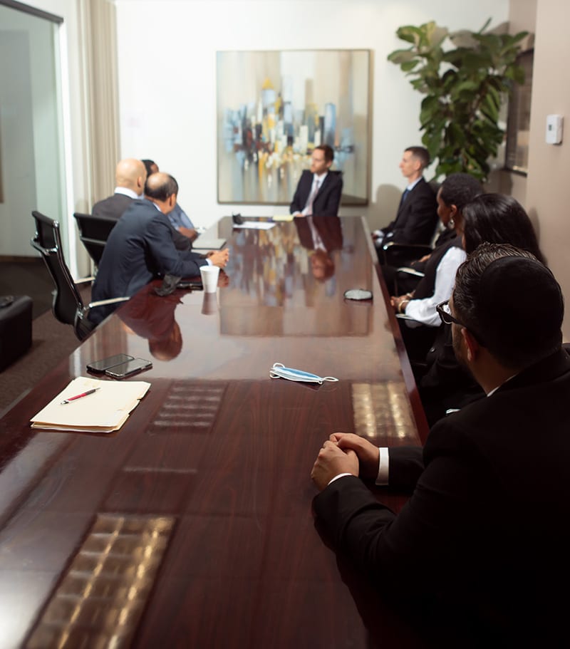 Legal team discussing with a client