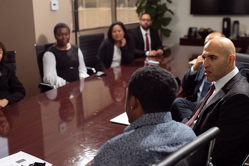 Legal team having a discussion with a client