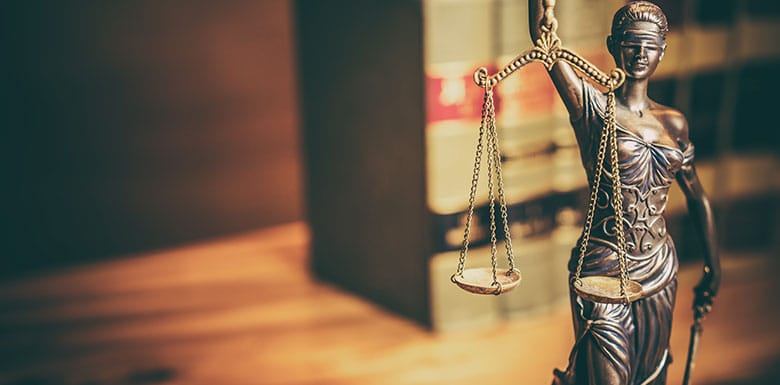 Justice-Statute-in-Front-of-Books-About-CA-SB-1437